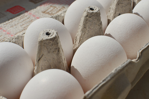 Packing detail with large white eggs, perfect for delicious and healthy recipes.