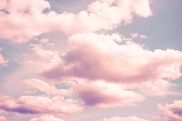 istock Surreal sky purple pink clouds dreaming fantasy 1562974394