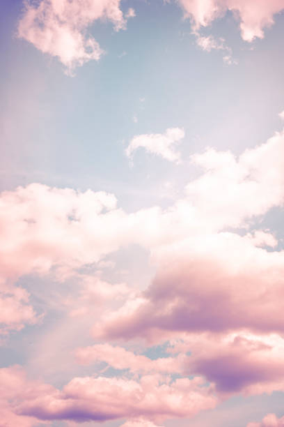 istock Surreal sky purple pink clouds dreaming fantasy 1562974416