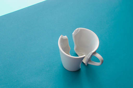 Detail of a broken cup, portraying the impermanence and transience of life.