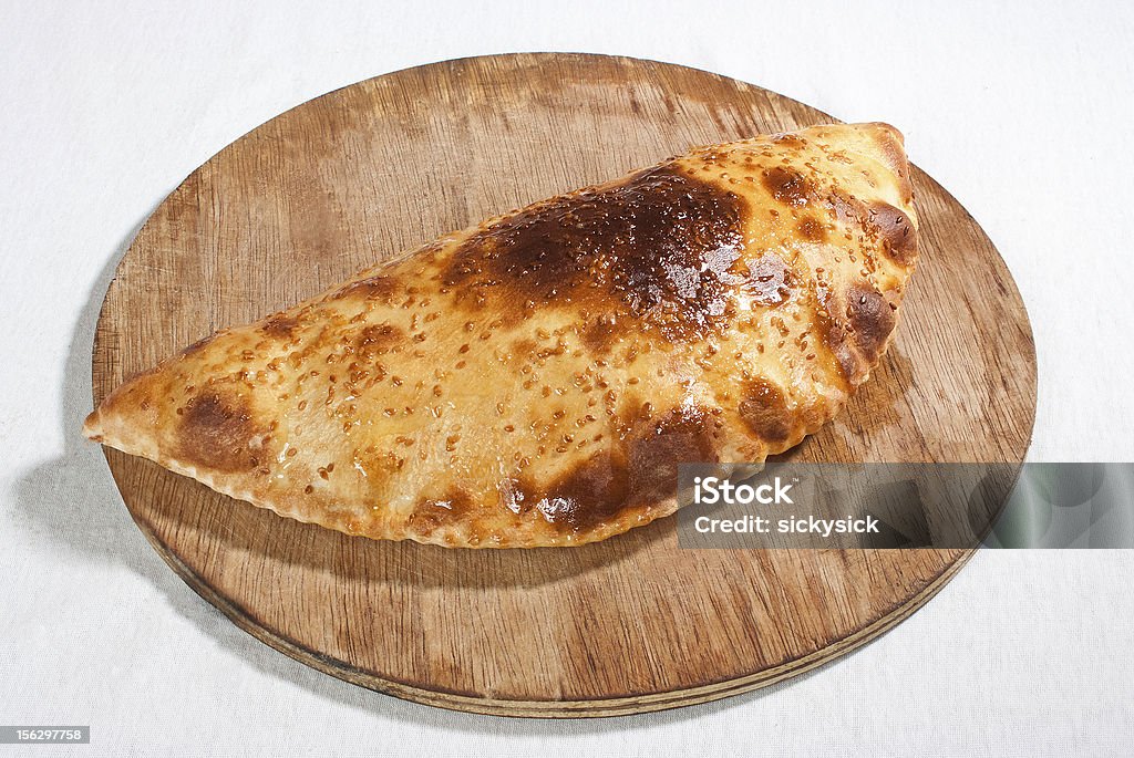 Pizza Calzone - Foto stock royalty-free di Alimentazione sana