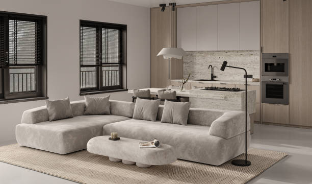 istock Beige living room interior with concrete floor, ceiling lamp and kitchen island. Panoramic window on tropics, corner view. 3d rendering. High quality 3d illustration 1562980604