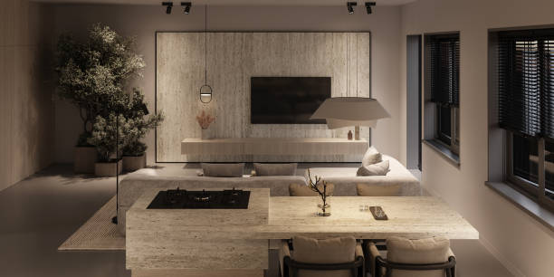 istock Beige living room interior with tv wall, ceiling lamp and kitchen island. Panoramic windows and night lighting. 3d rendering. High quality 3d illustration 1562980630