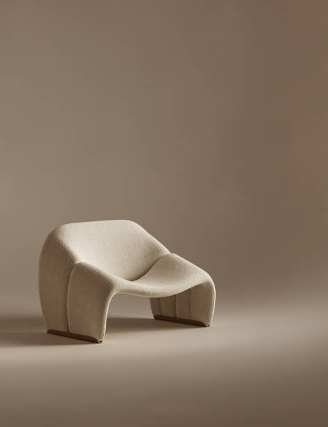 istock Conceptual interior room with stucco wall. Creative composition armchair in warm pastel color. Mockup empty background. 3d rendering. High quality 3d illustration 1562980673