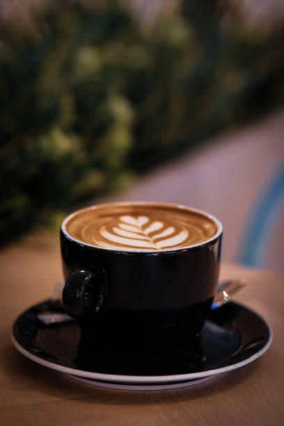 istock selective focus of cappucino with latte art 1562988637