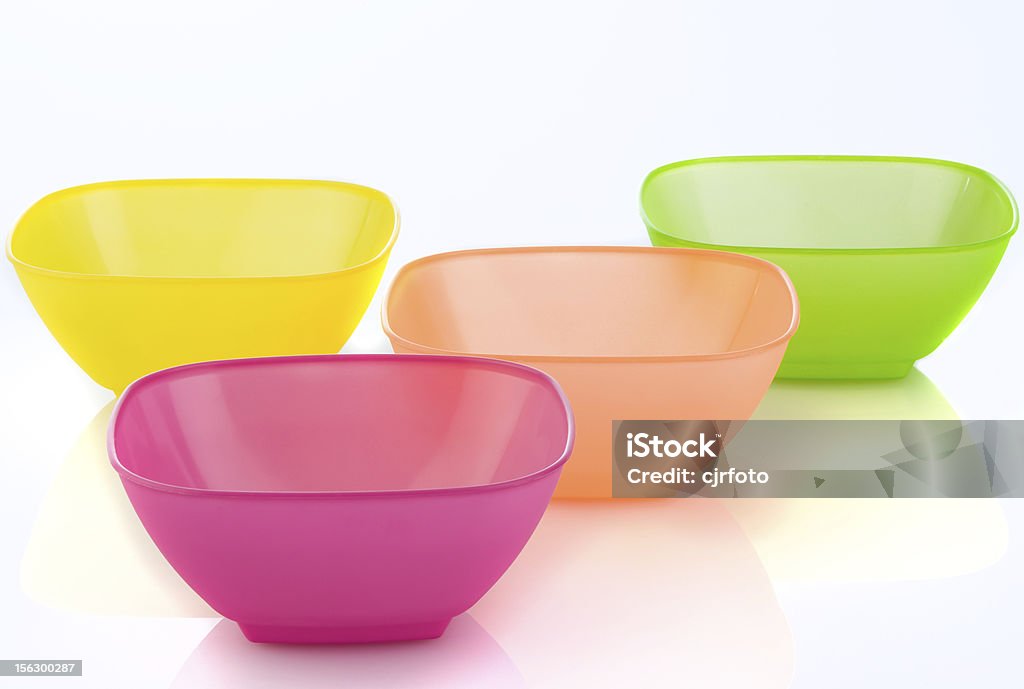 Colorful Plastic Bowls Colorful Plastic Bowls on a white background Bowl Stock Photo