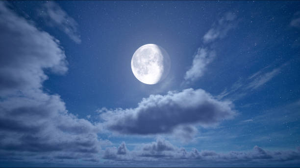 istock Full moon night and starry sky with moving clouds 1563006353