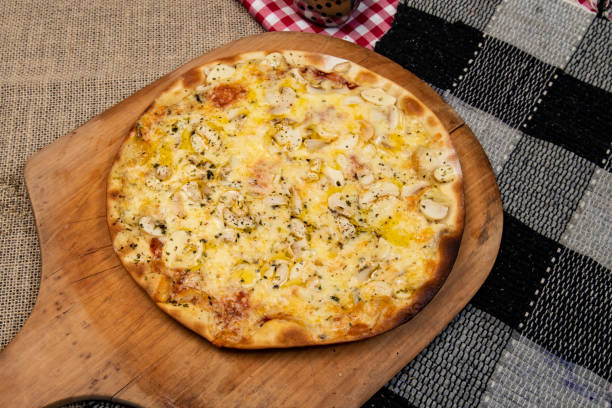 istock Brazilian pizza with mushroom, cheese and oregano 1563006357
