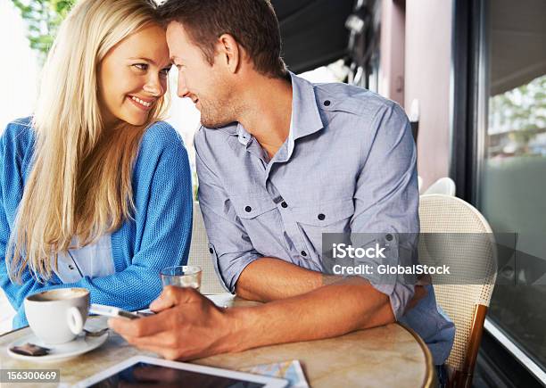Enjoying Each Others Company Stock Photo - Download Image Now - Couple - Relationship, Face To Face, Mobile Phone