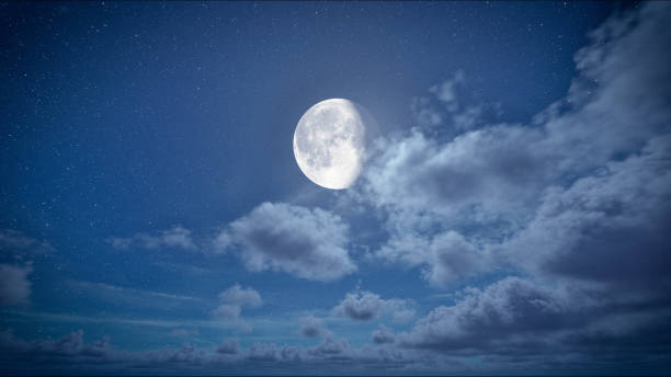 istock moon on the starry sky with clouds moving at night 1563006962