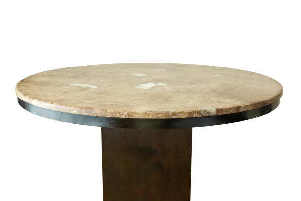 istock Marble stone table top isolated on white background for product display 1563011407