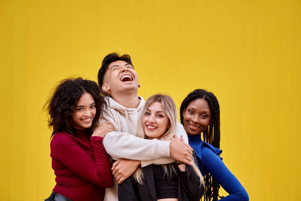istock Happy multi-ethnic friends posing together. 1563011937