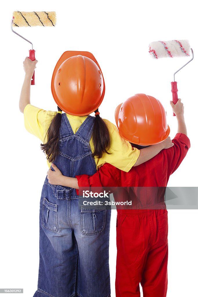 Dwoje dzieci w kombinezon z wałki do farb - Zbiór zdjęć royalty-free (Dziecko)