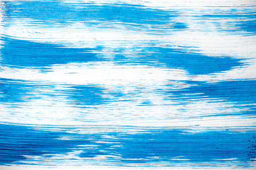 Abstract white and blue background painted with watercolor