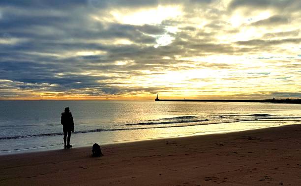 istock Sunrise at the beach 1563036535