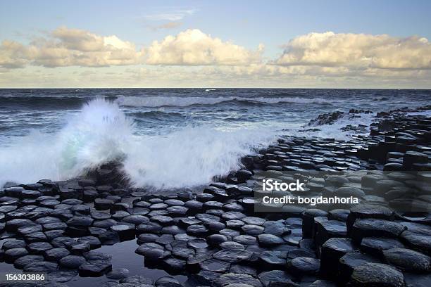 Waves Splashing On Stones From The Giants Causeway Stock Photo - Download Image Now