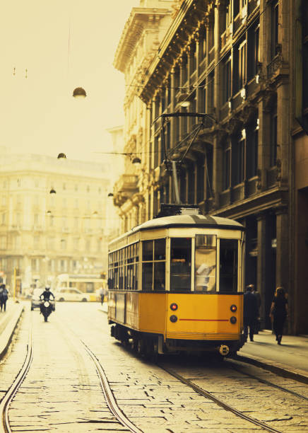 milan gelbes tram - milan italy cable car old italy stock-fotos und bilder