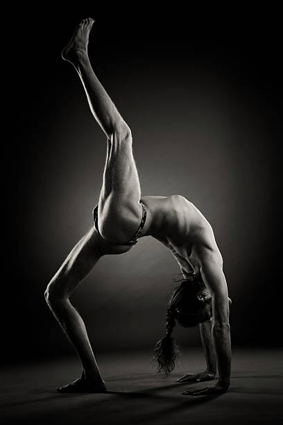 istock Adult Man Practicing Yoga 156306495