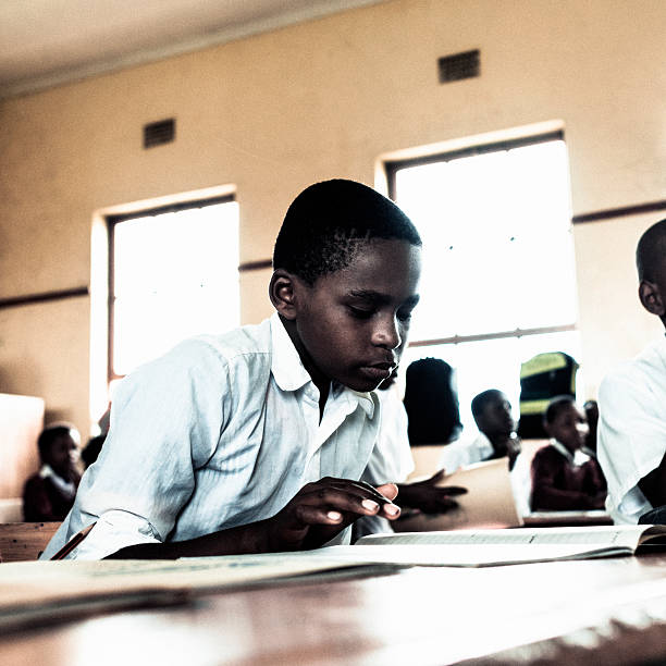 istock Little African boy in classroom 156306970