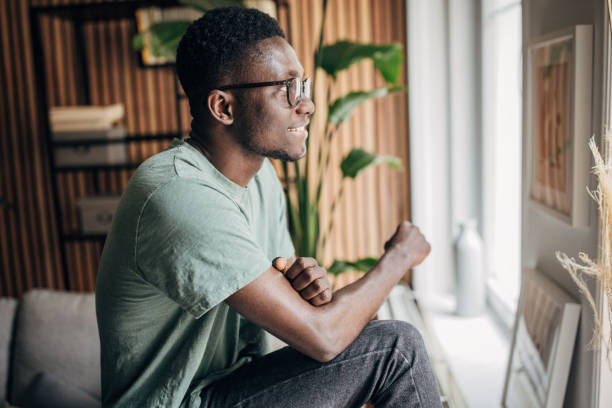 istock Man relaxing at home 1563107988