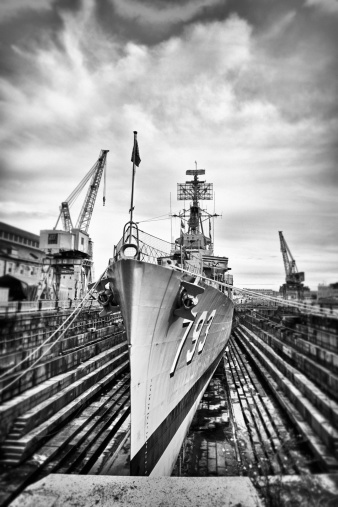 Navy Warship USS Cassin Young moored in dry dock one at Charleston Navy Yard in Boston, Mass