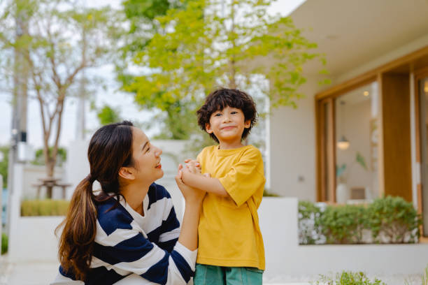 istock Affectionate mother and son having happiness moments at home. 1563227372