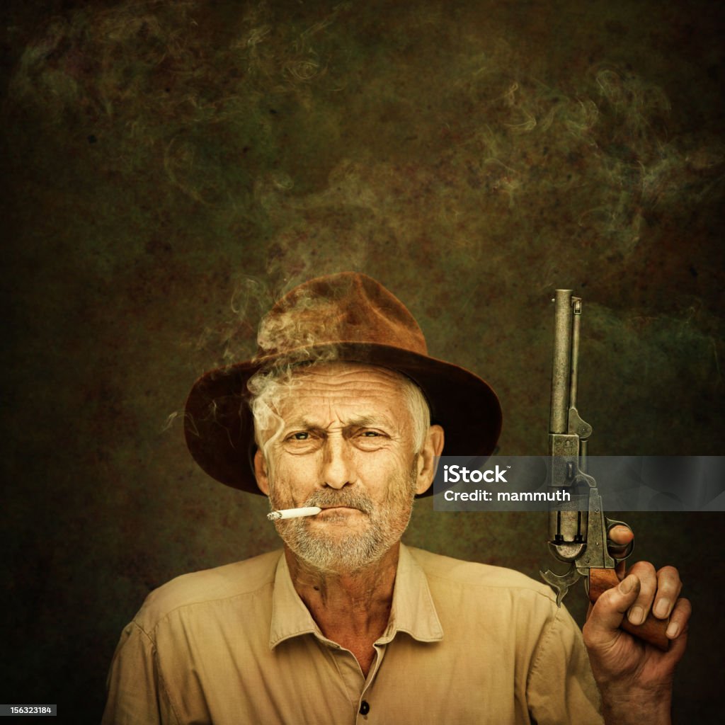 Velho Vaqueiro com Smith Wesson - Royalty-free Vaqueiro Foto de stock