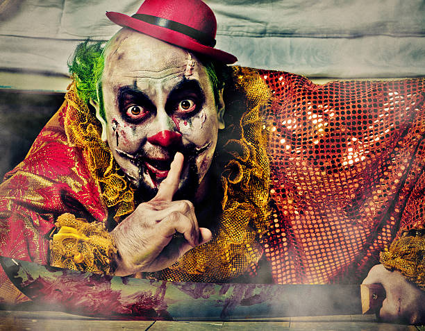Evil Clown under bed  face paint halloween adult men stock pictures, royalty-free photos & images