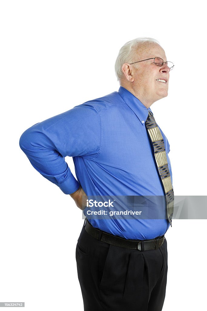 Senior hombre con dolor de espalda intenso - Foto de stock de Dolor de espalda libre de derechos