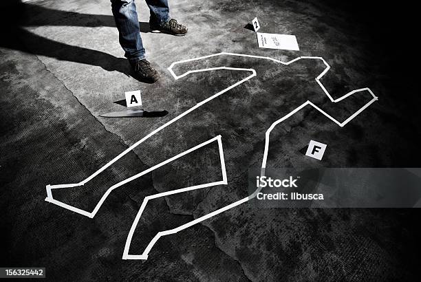 Murderer Back On The Crime Scene Stock Photo - Download Image Now - Crime Scene, Murder, Chalk Outline