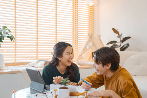 istock Couple doing home finances together at home. 1563268792