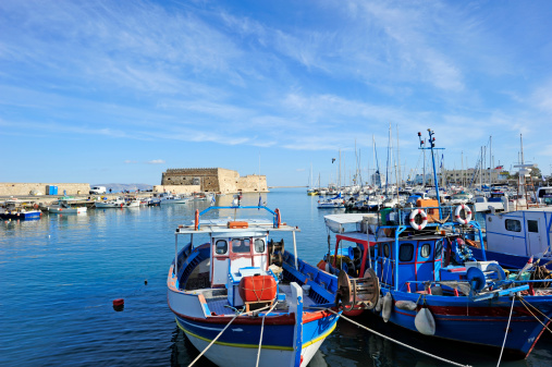 Iraklion port with fortress in backgroun,Crete