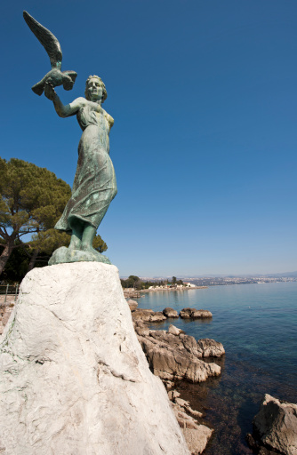 Opatija  with historic statue-symbol of touristic place.