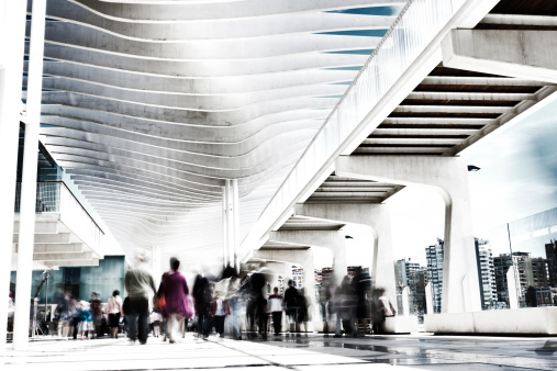 Port of Malaga, Spain. Motion blurred pedestrians