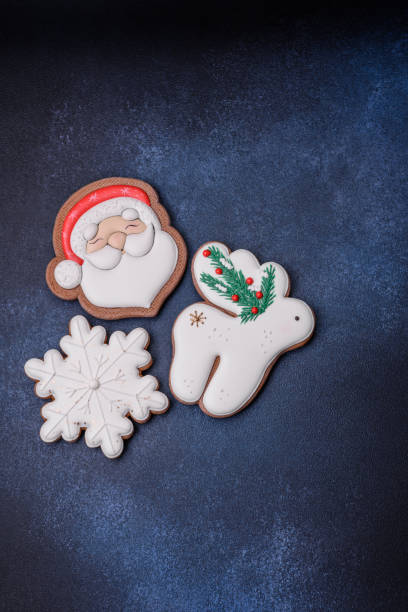 istock Beautiful festive Christmas gingerbread made by hand with decoration elements 1563358425