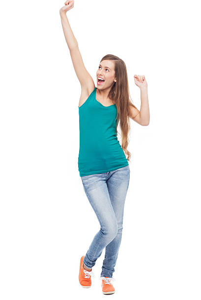 istock Happy woman with arms raised 156338588