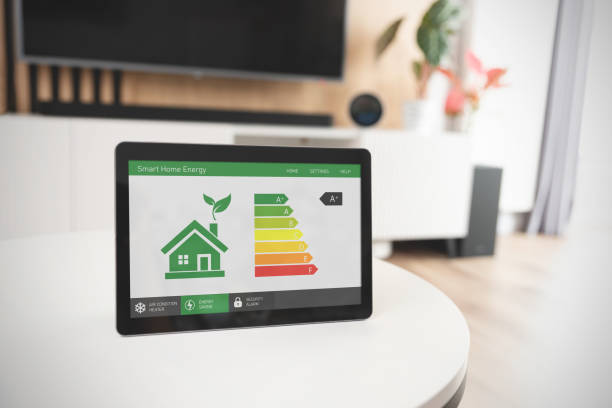 istock Energy efficiency mobile app on screen, eco house 1563408144