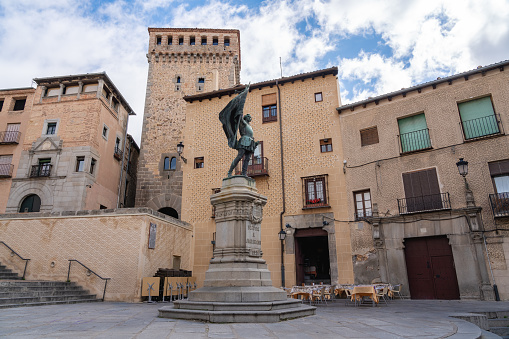 Segovia, Spain - Mar 13, 2019: Juan Bravo Monument at Plaza Medina del Campo Square - Segovia, Spain