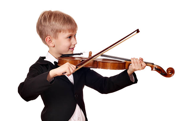 istock boy in tuxedo play violin 156344201