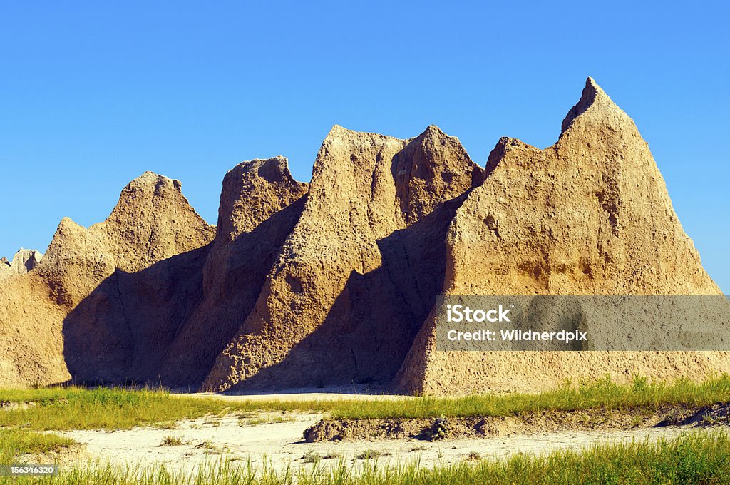 Des ombres dans la lumière du matin - Photo de Aiguille rocheuse libre de droits