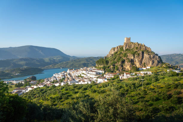 Zahara de la Sierra with Castle and Reservoir Lake - Zahara de la Sierra, Andalusia, Spain Zahara de la Sierra with Castle and Reservoir Lake - Zahara de la Sierra, Andalusia, Spain grazalema stock pictures, royalty-free photos & images