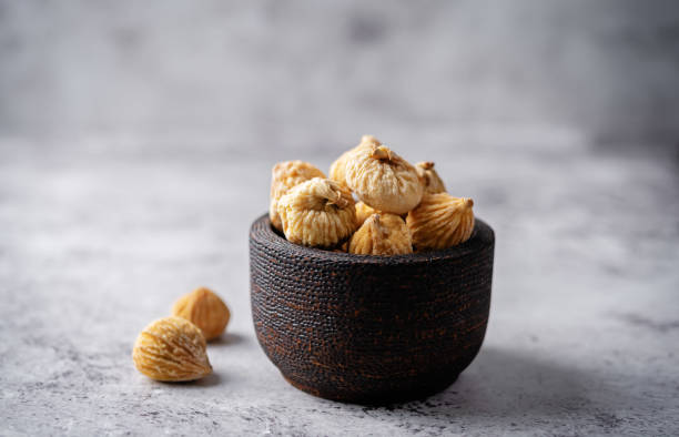 istock Dried Figs fruits on a background 1563473673