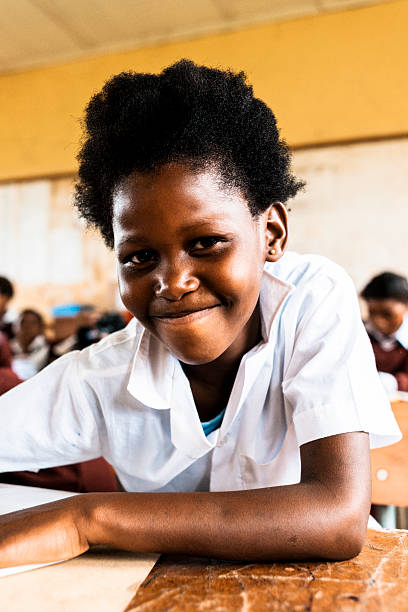 istock Little African girl sitting in Classroom 156347535