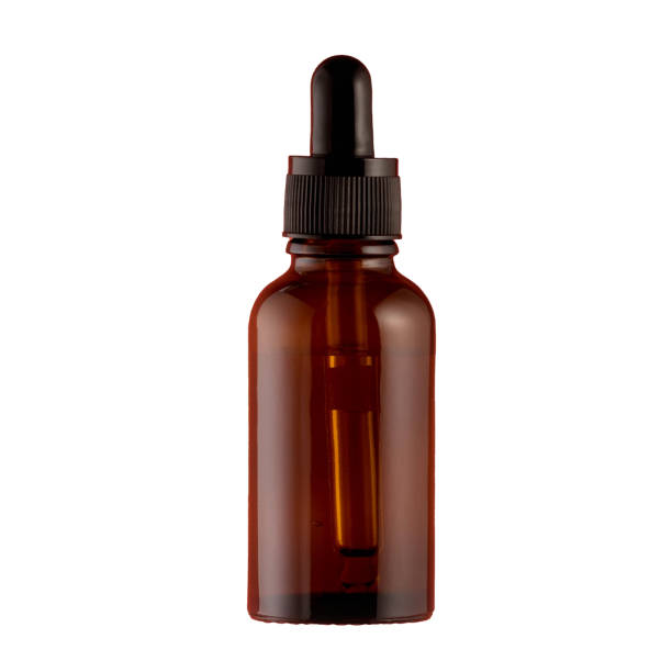istock Essential Oil Bottle on White Background 1563488118