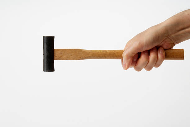 istock Isolated shot of hammering against white background 156349749