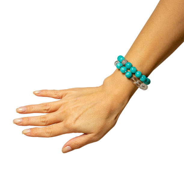 istock an amazonite bracelet on a woman's hand. white background 1563502730