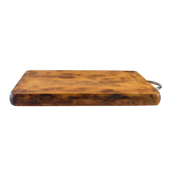 istock an old worn-out wooden cutting board. isolated on white. 1563503846
