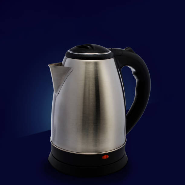 istock electric metal kettle on a blue background 1563504980