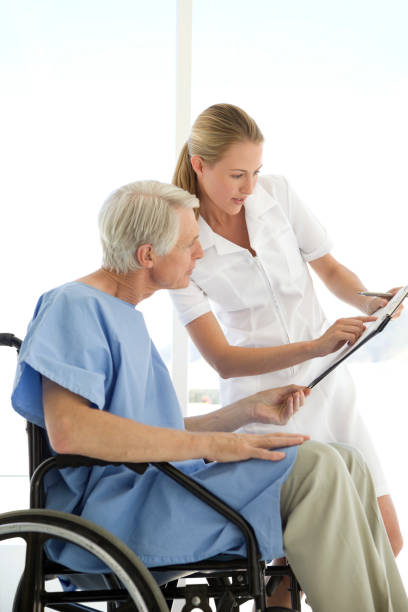 istock Reading the medical report 156352136