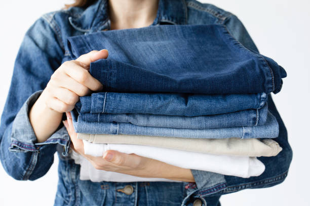 istock Woman Holding Jeans 1563522023